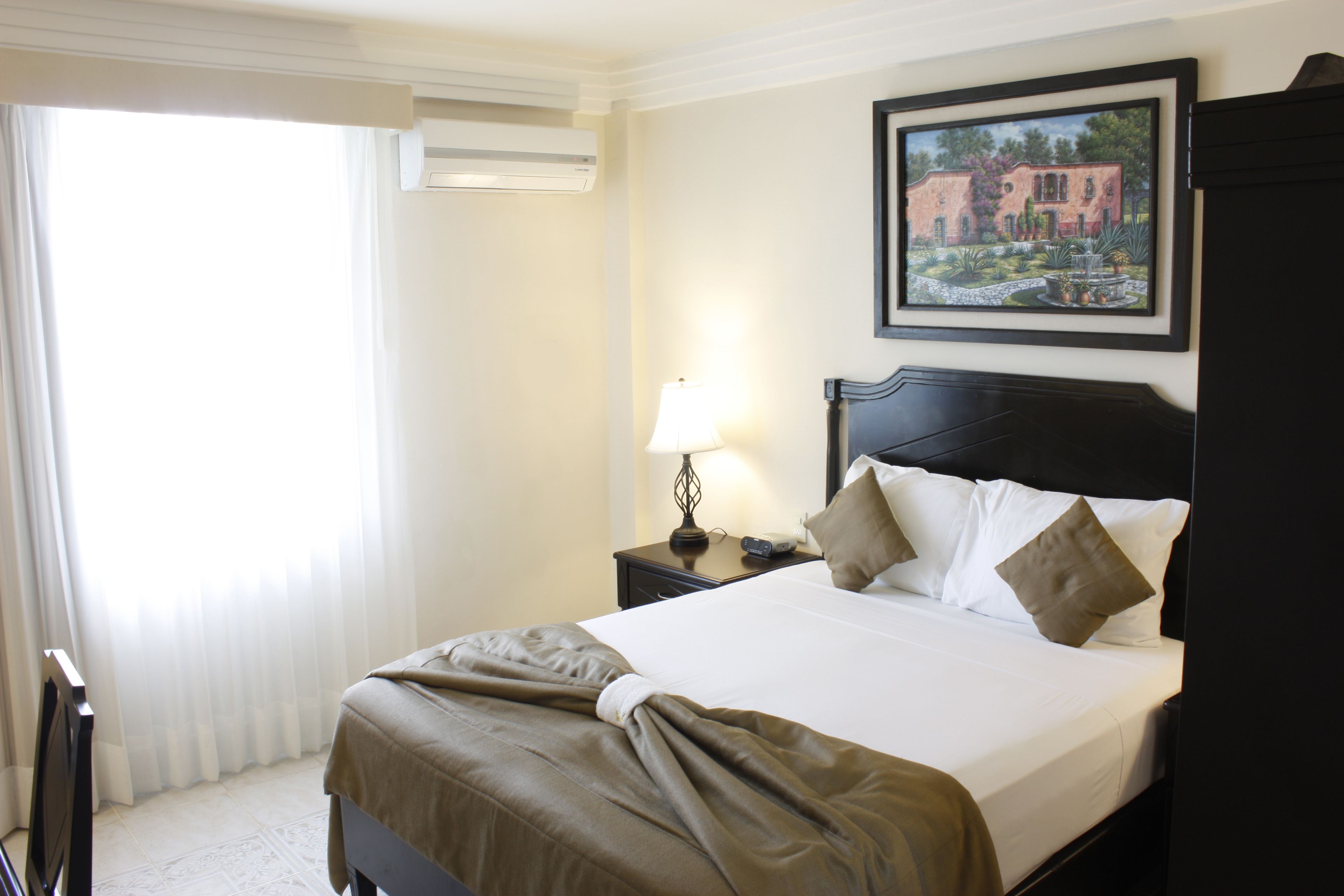 double room, refrigerator, city view | premium bedding, in-room safe, desk, iron/ironing board