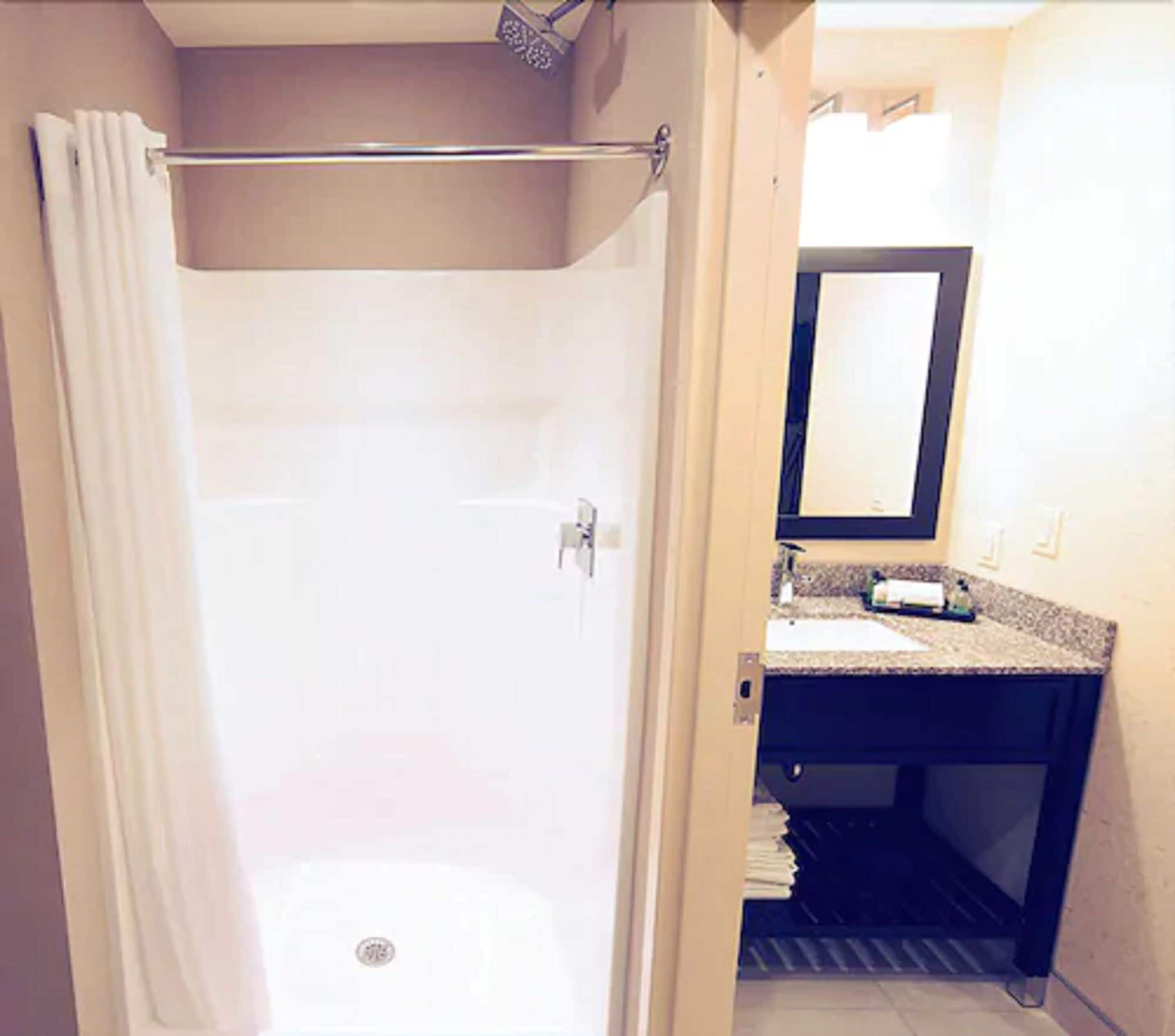 standard room, 2 queen beds | bathroom | shower, free toiletries, hair dryer, towels