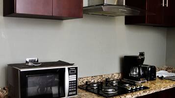 Departamento Deluxe, vista a la montaña | Cocina privada | Microondas y tetera eléctrica
