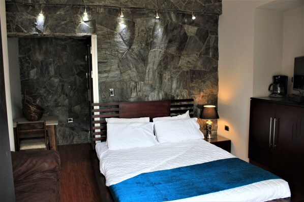 Luxury Room, 1 Queen Bed, Private Bathroom, Ground Floor | Minibar, in-room safe, individually decorated, individually furnished