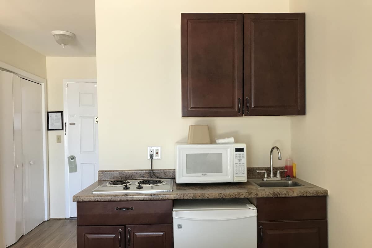 Mini-fridge, microwave, coffee/tea maker, toaster