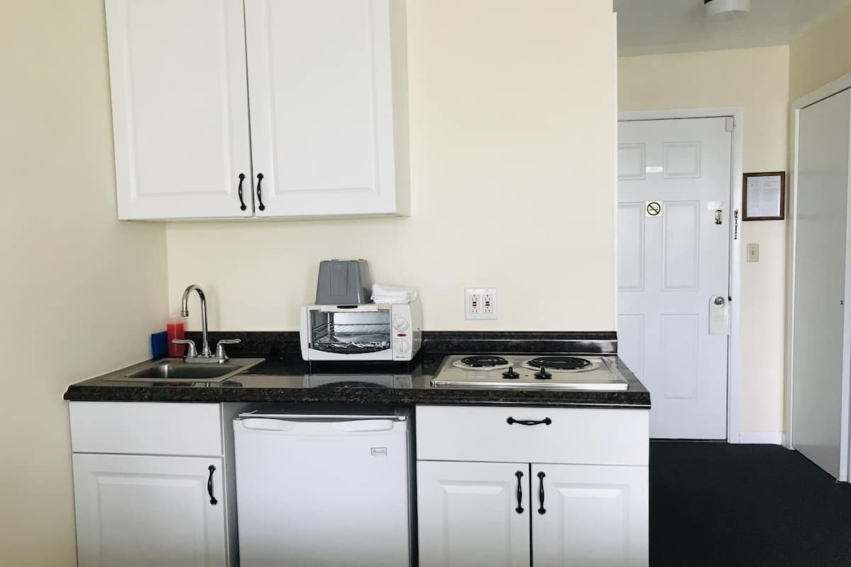 Mini-fridge, microwave, coffee/tea maker, toaster