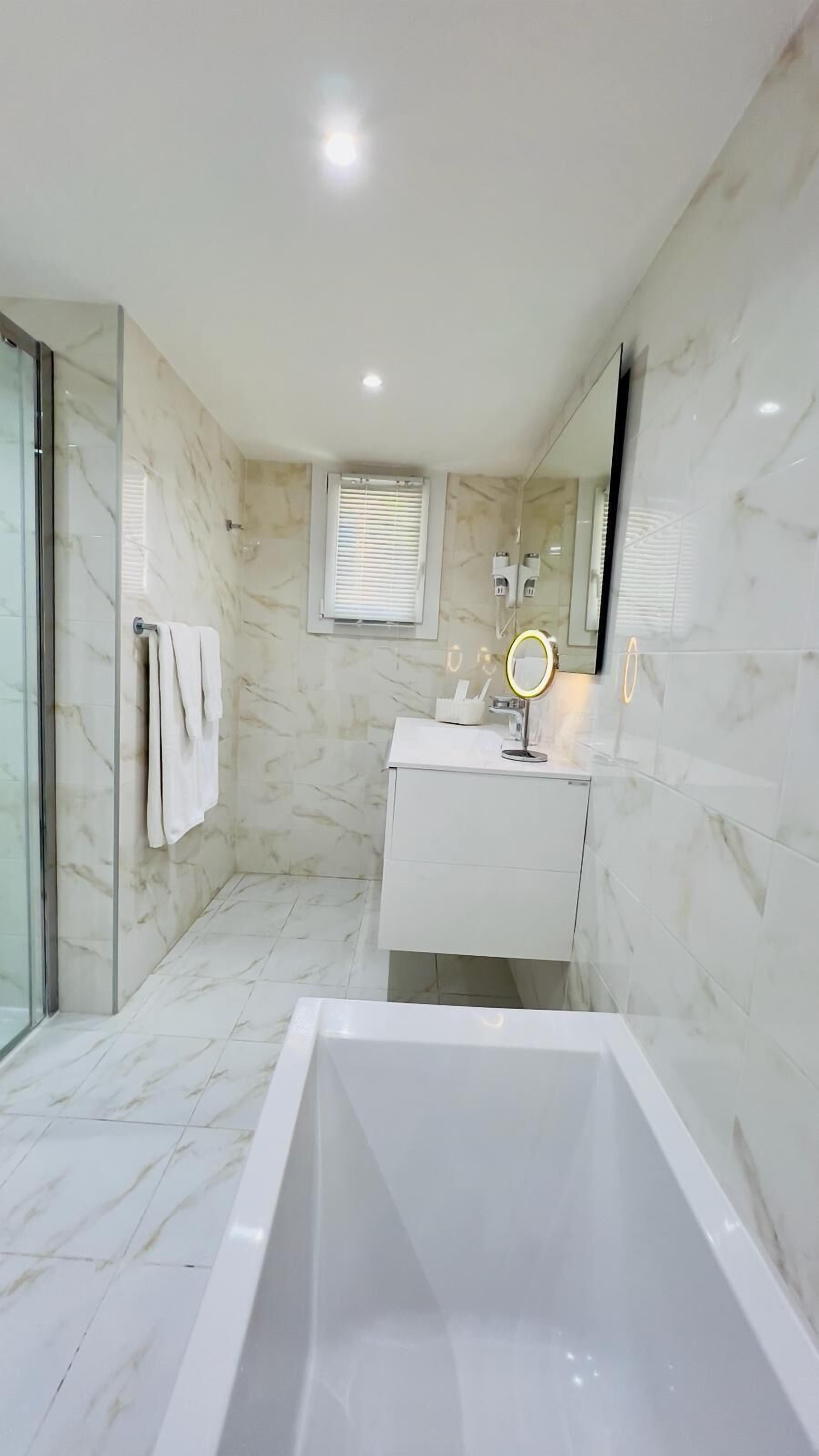 free toiletries, hair dryer, bathrobes, slippers