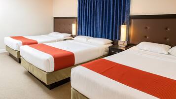 Family Room, 3 Queen Beds | 1 bedroom, desk, laptop workspace, iron/ironing board