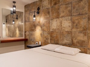 Desk, laptop workspace, bed sheets