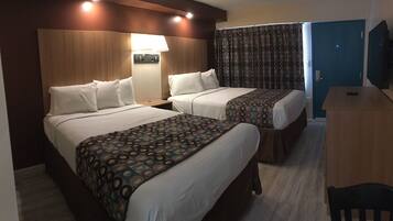 Premium bedding, blackout drapes, free WiFi, bed sheets