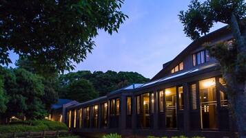 Situated in a serene natural setting, this building features clean lines and a contemporary design.