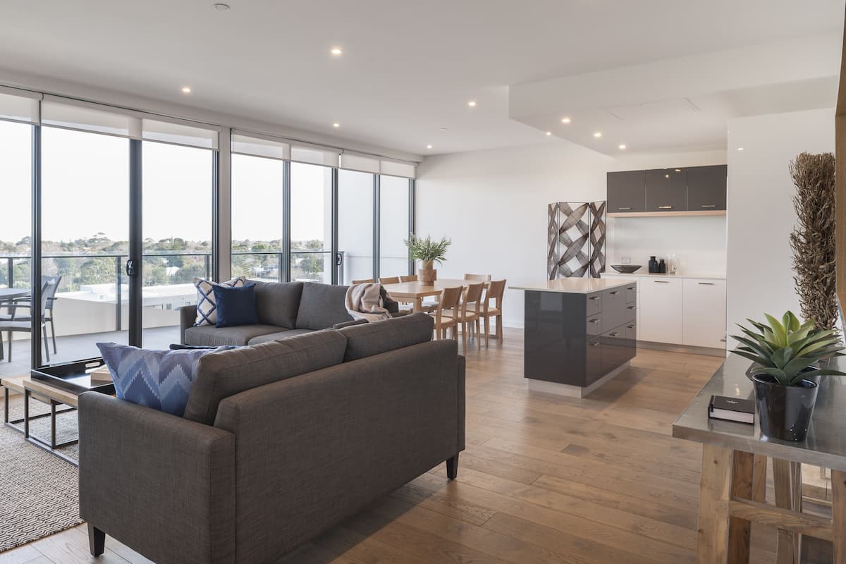 Premium Three Bedroom Apartment | Living room | 50-inch Smart TV with digital channels, TV, streaming services