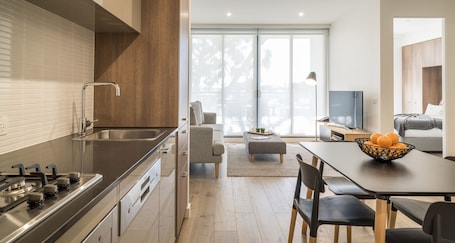 Superior Two Bedroom Apartment | Private kitchen | Full-size fridge, microwave, oven, stovetop