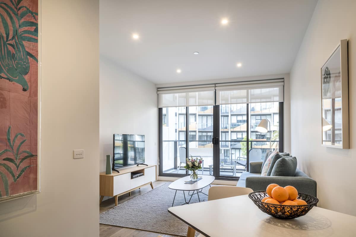 Premium One Bedroom Apartment | Living area | 50-inch Smart TV with digital channels, TV, streaming services