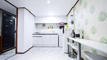 Fridge, microwave, electric kettle, cookware/dishes/utensils