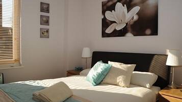 Apartment, 2 Bedrooms (The Courtyard 2) | 1 bedroom, iron/ironing board, cribs/infant beds, free WiFi