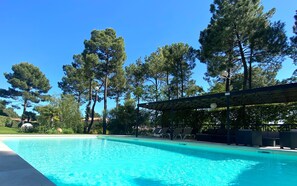 Seasonal outdoor pool, open 9:00 AM to 8:00 PM, sun loungers