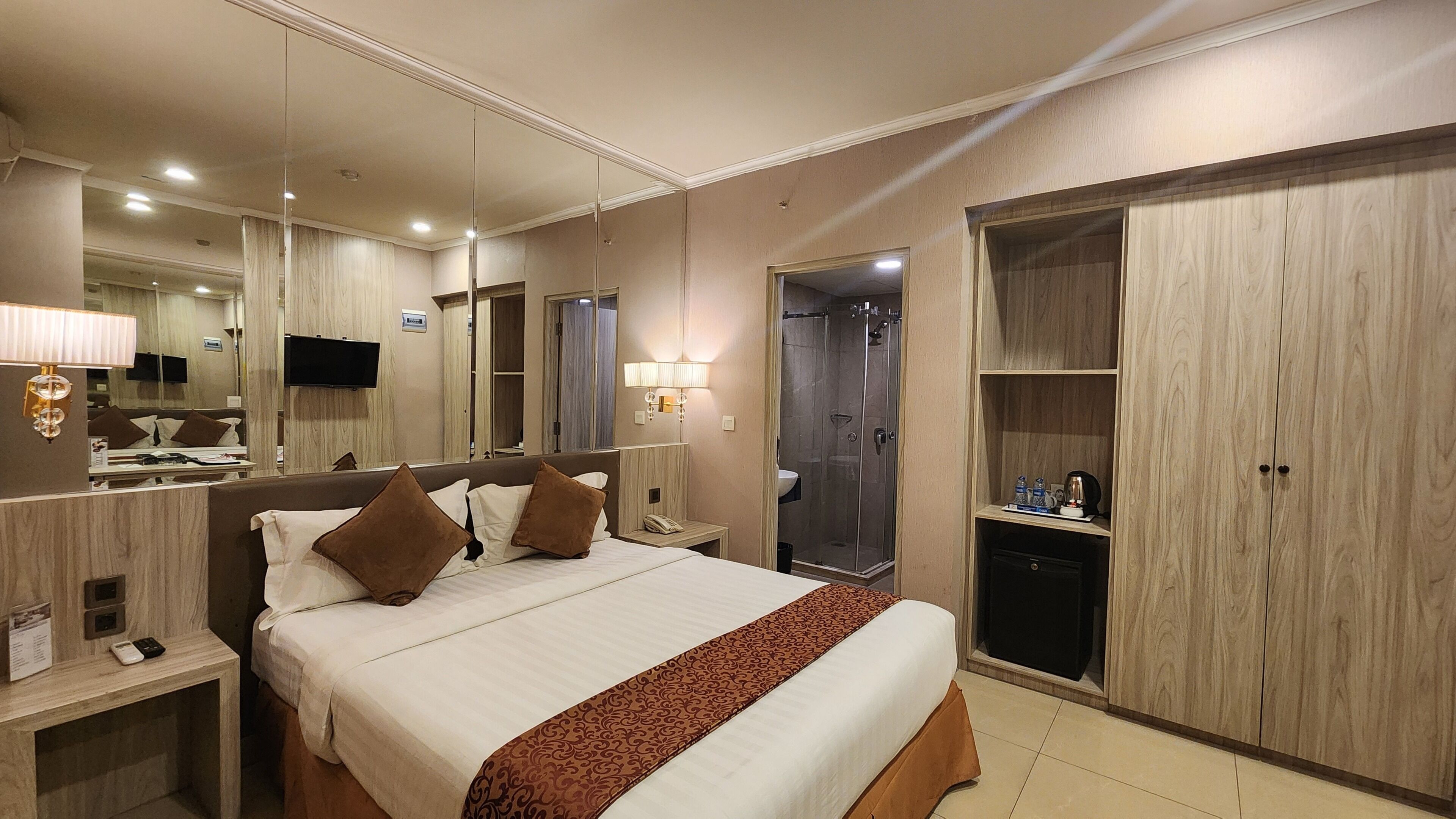 Superior Room | Minibar, in-room safe, individually decorated, desk