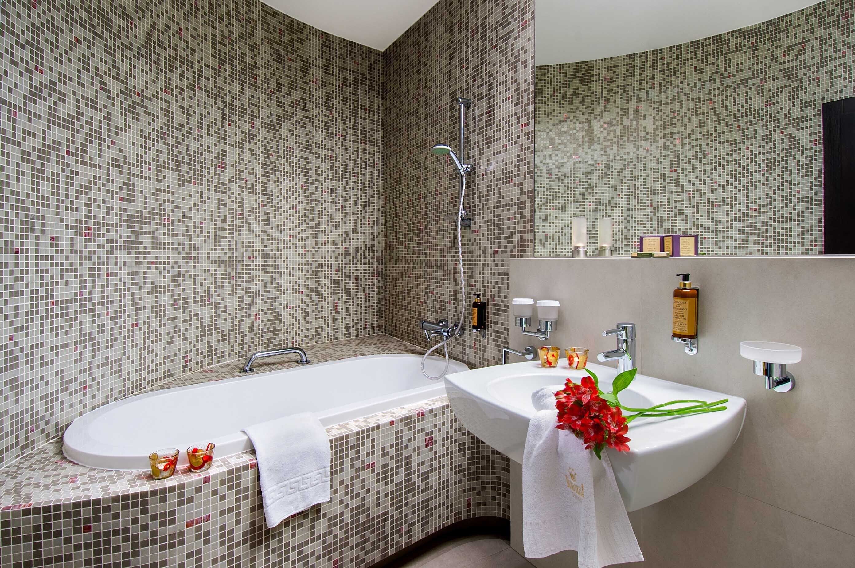 executive twin room | bathroom | bathtub, designer toiletries, hair dryer, bathrobes