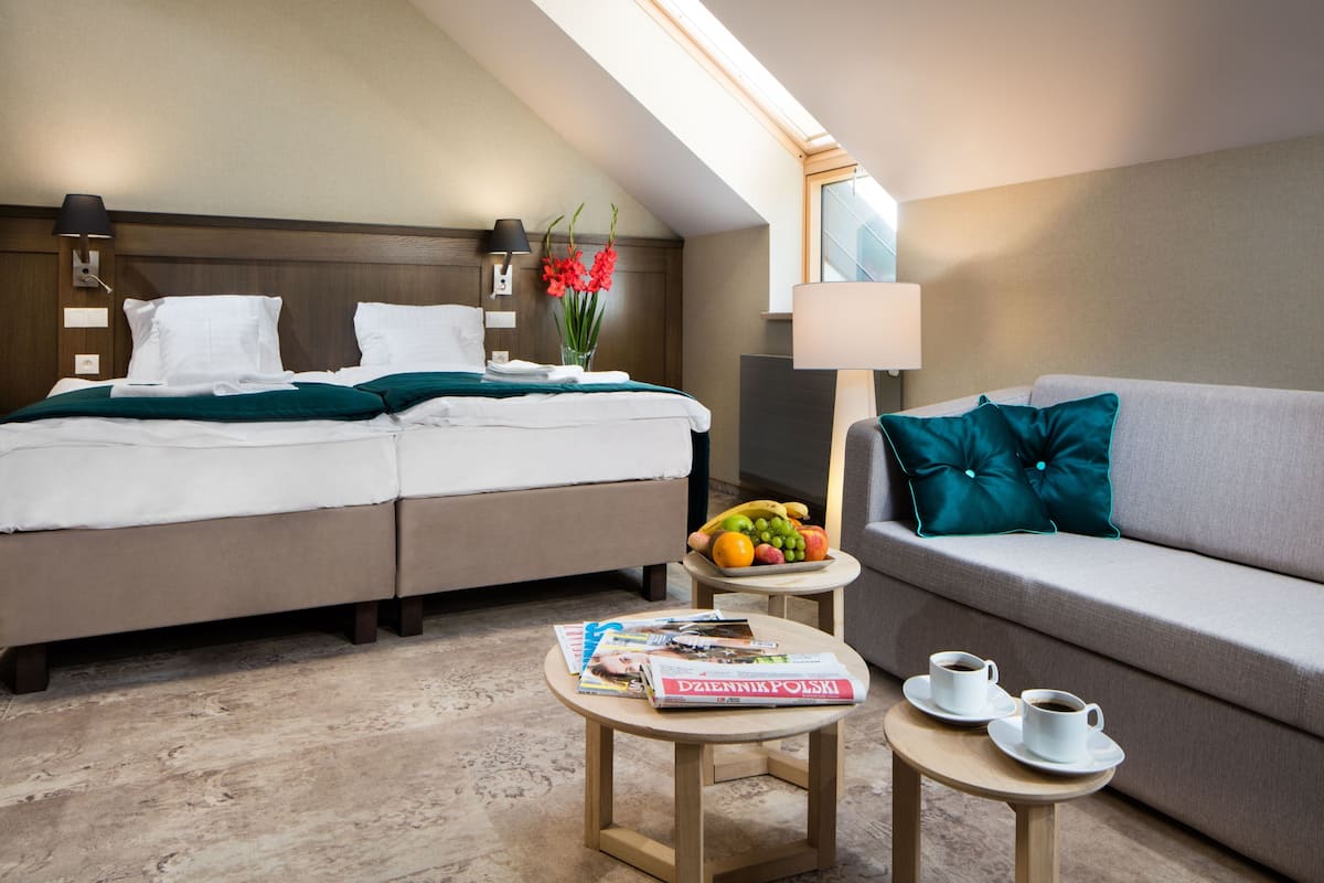 Deluxe Room, 1 Bedroom, Ensuite | Down comforters, desk, laptop workspace, iron/ironing board