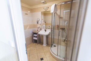 Shower, hair dryer, bathrobes, slippers
