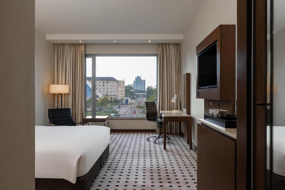 Quarto superior | Roupas de cama premium, frigobar, cofres nos quartos, escrivaninha