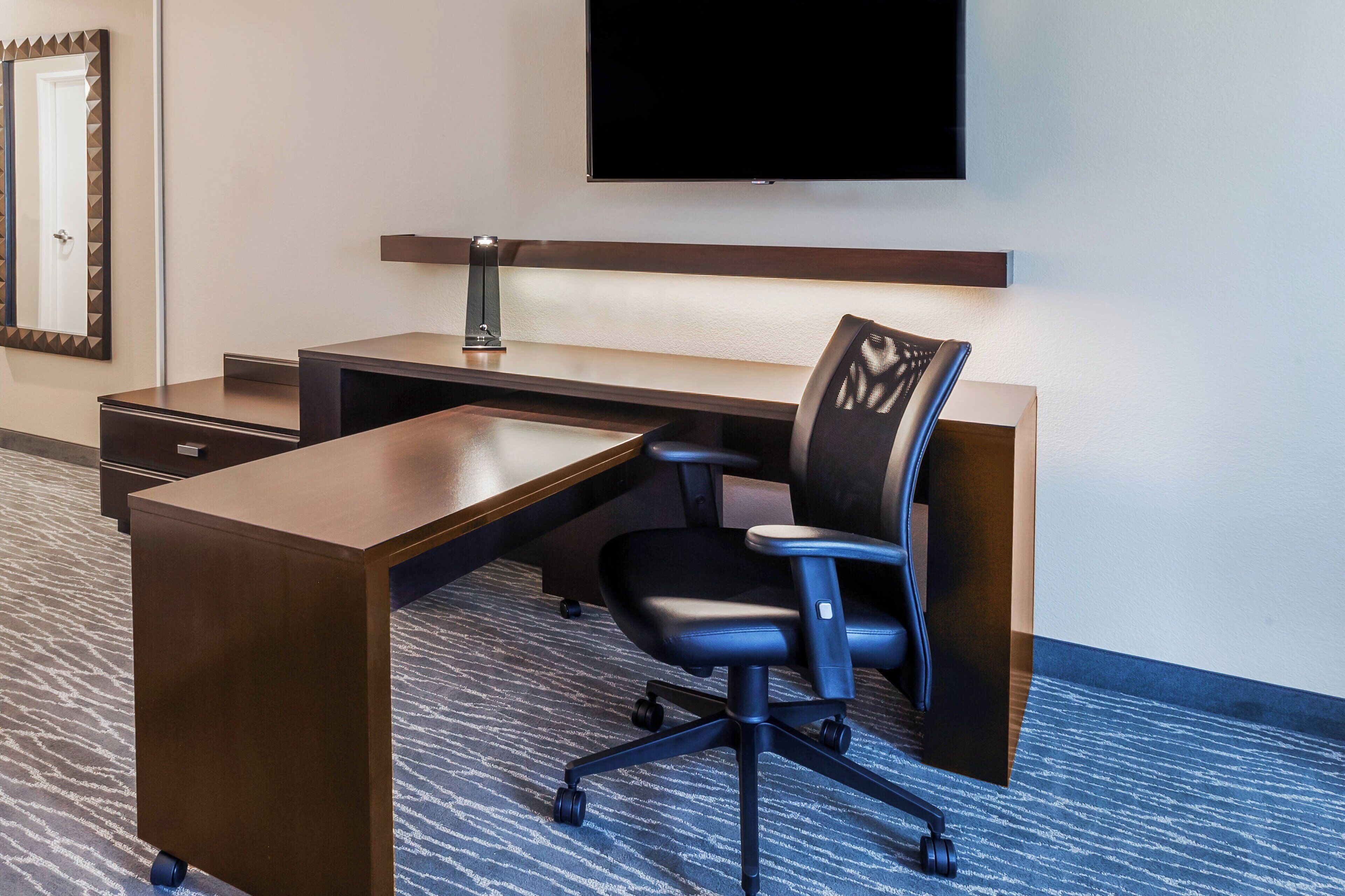 desk, blackout curtains, iron/ironing board, free cots/infant beds