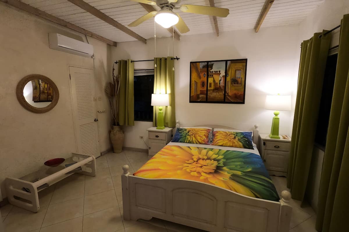 apartment, 1 bedroom, kitchen, partial sea view | 1 bedroom, premium bedding, in-room safe, individually decorated