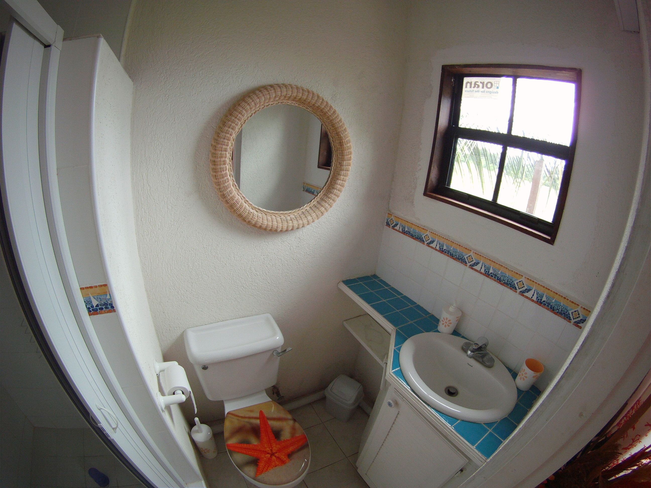 apartment, 1 bedroom, kitchen, partial sea view | bathroom | shower, hair dryer, towels