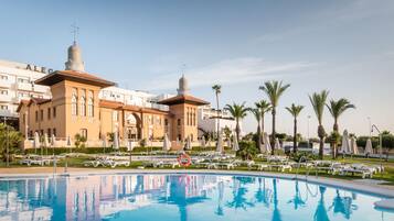 Outdoor pool, pool umbrellas, pool loungers