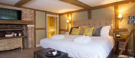 Habitación familiar | Sábanas de algodón egipcio y decoración personalizada