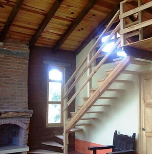 Cabin, 2 Bedrooms | Living area | 20-inch TV with cable channels, fireplace