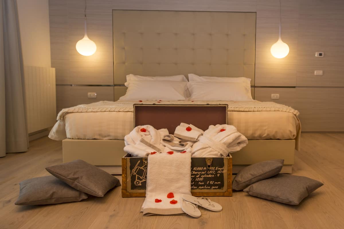 Familien-Suite, 1 Schlafzimmer, Sauna (Accesso SPA) | 1 Schlafzimmer, hochwertige Bettwaren, Minibar, Zimmersafe