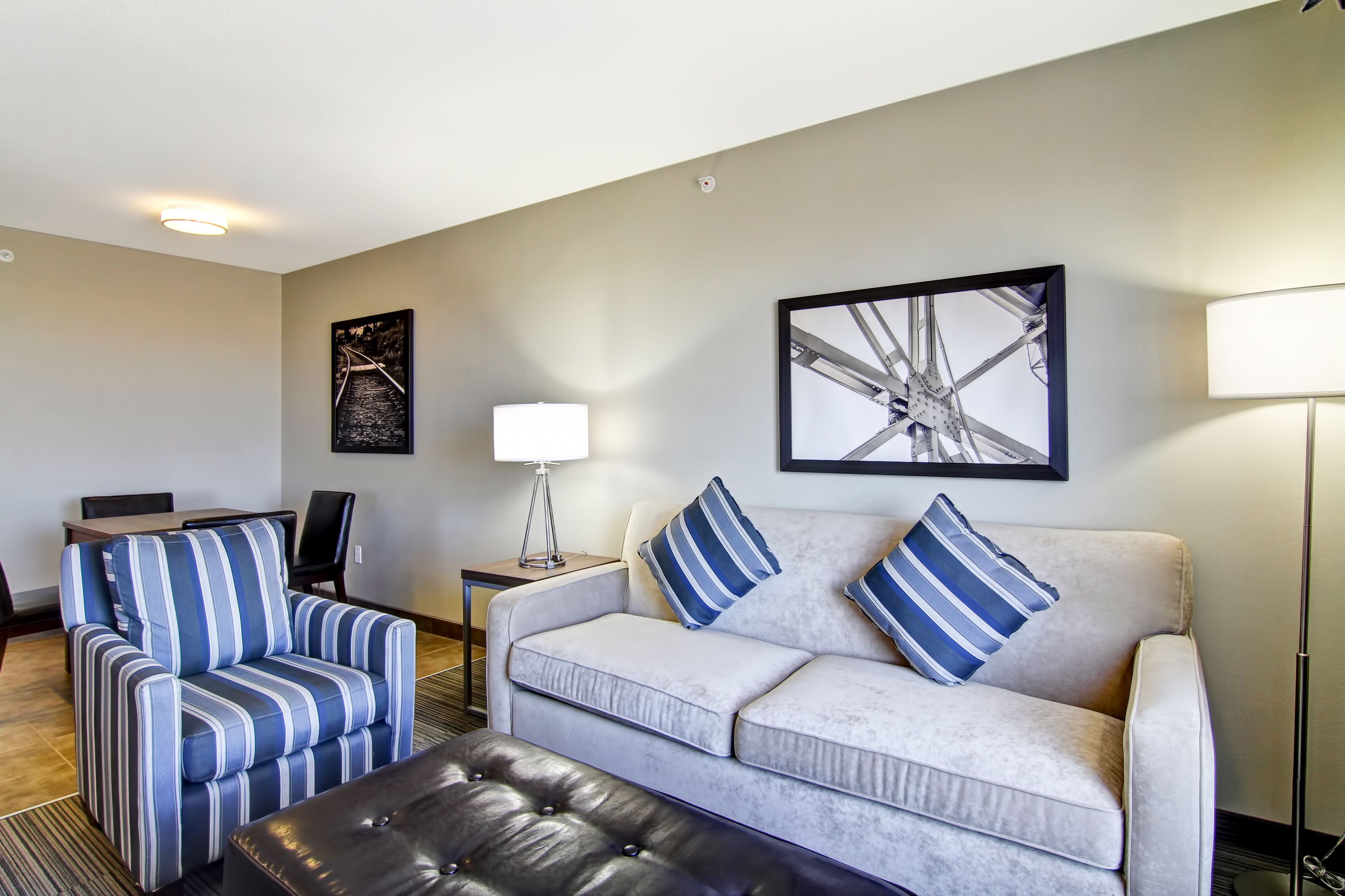 room, 1 king bed, kitchenette | living area | flat-screen tv