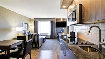Room, 1 King Bed, Kitchenette | Private kitchen | Fridge, microwave, coffee/tea maker