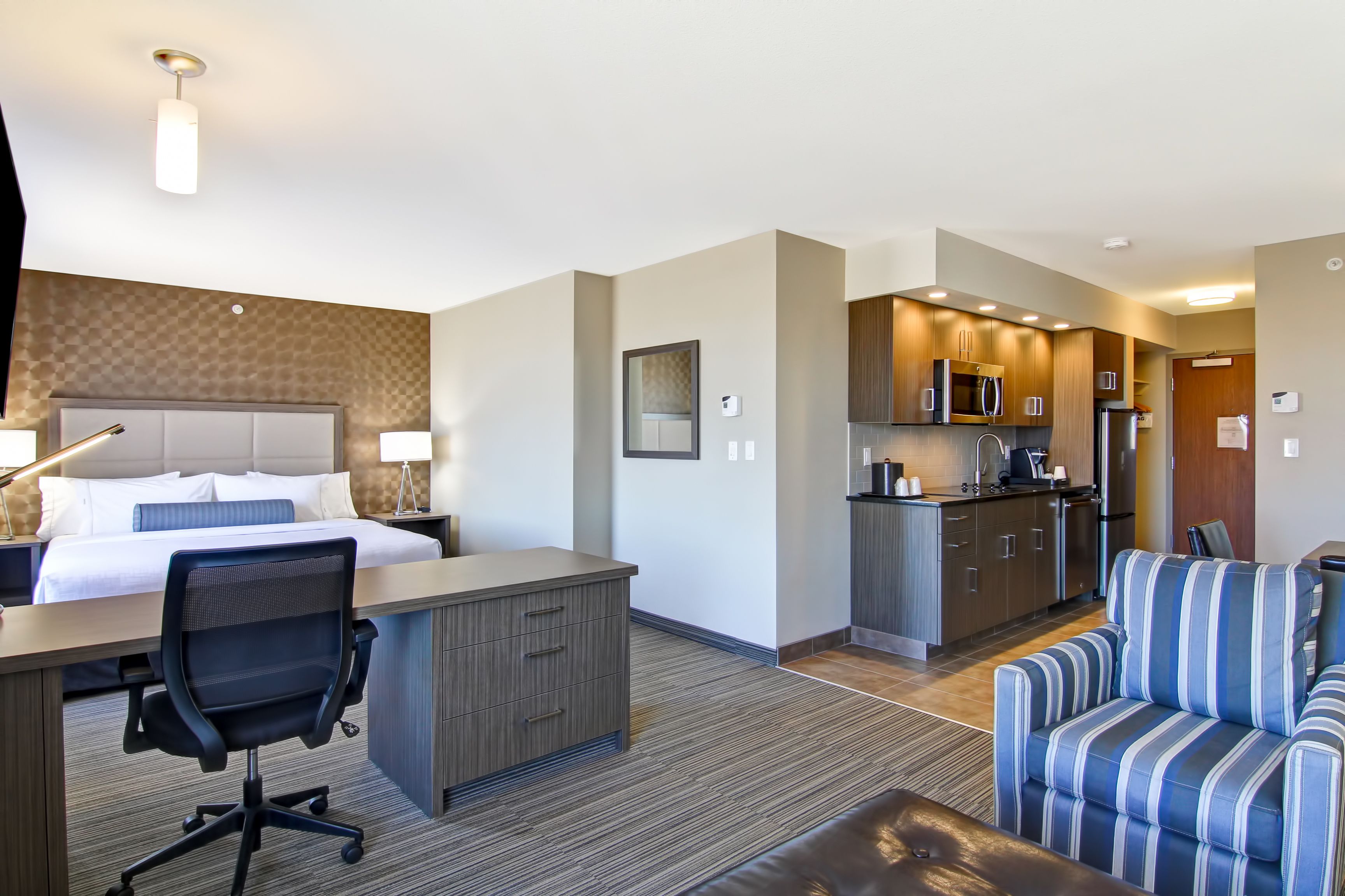 room, 1 king bed, kitchenette | desk, laptop workspace, blackout curtains, iron/ironing board