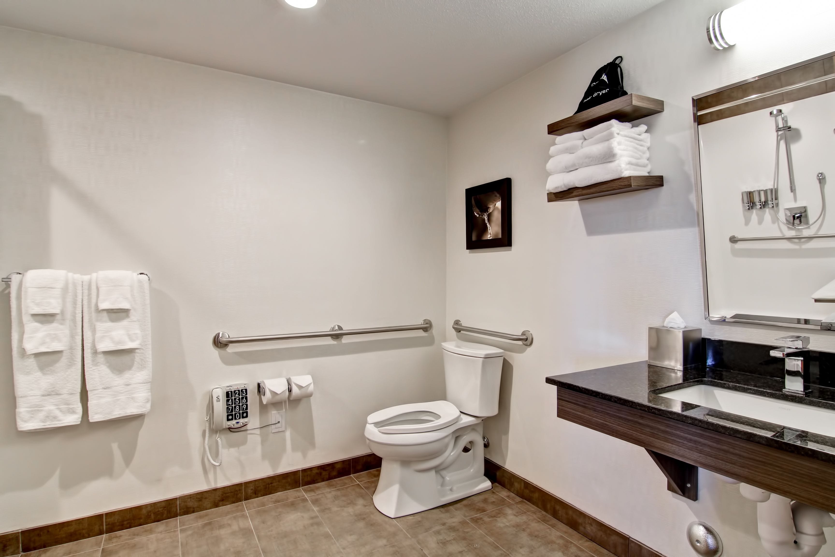 combined shower/bathtub, free toiletries, hair dryer, towels