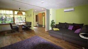 Familieleilighet, 1 soverom, hageutsikt (Rebstock) | Sengetøy av topp kvalitet, safe på rommet, skrivebord og lydisolert