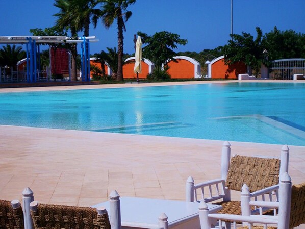 Outdoor pool, pool umbrellas, pool loungers