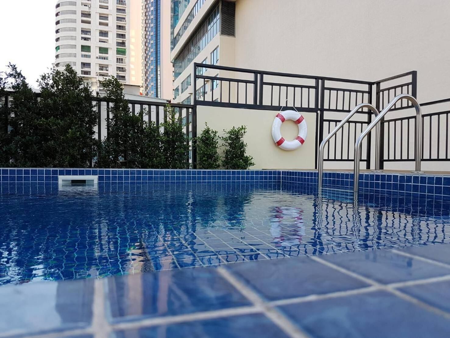 outdoor pool, pool umbrellas, pool loungers