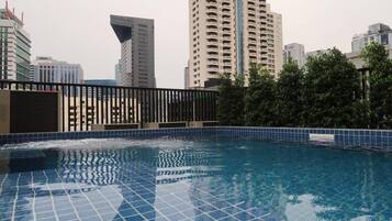 Outdoor pool, pool umbrellas, sun loungers