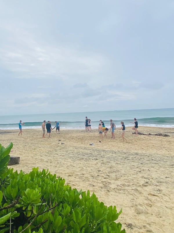 On the beach, white sand, sun loungers, beach umbrellas
