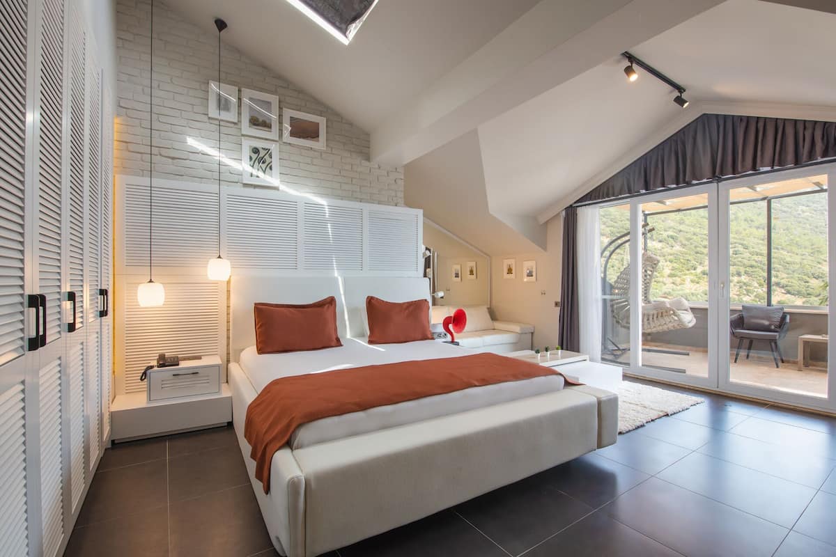 Honeymoon studio suite, uitzicht op zee | Een minibar, een kluis op de kamer, individueel gedecoreerd