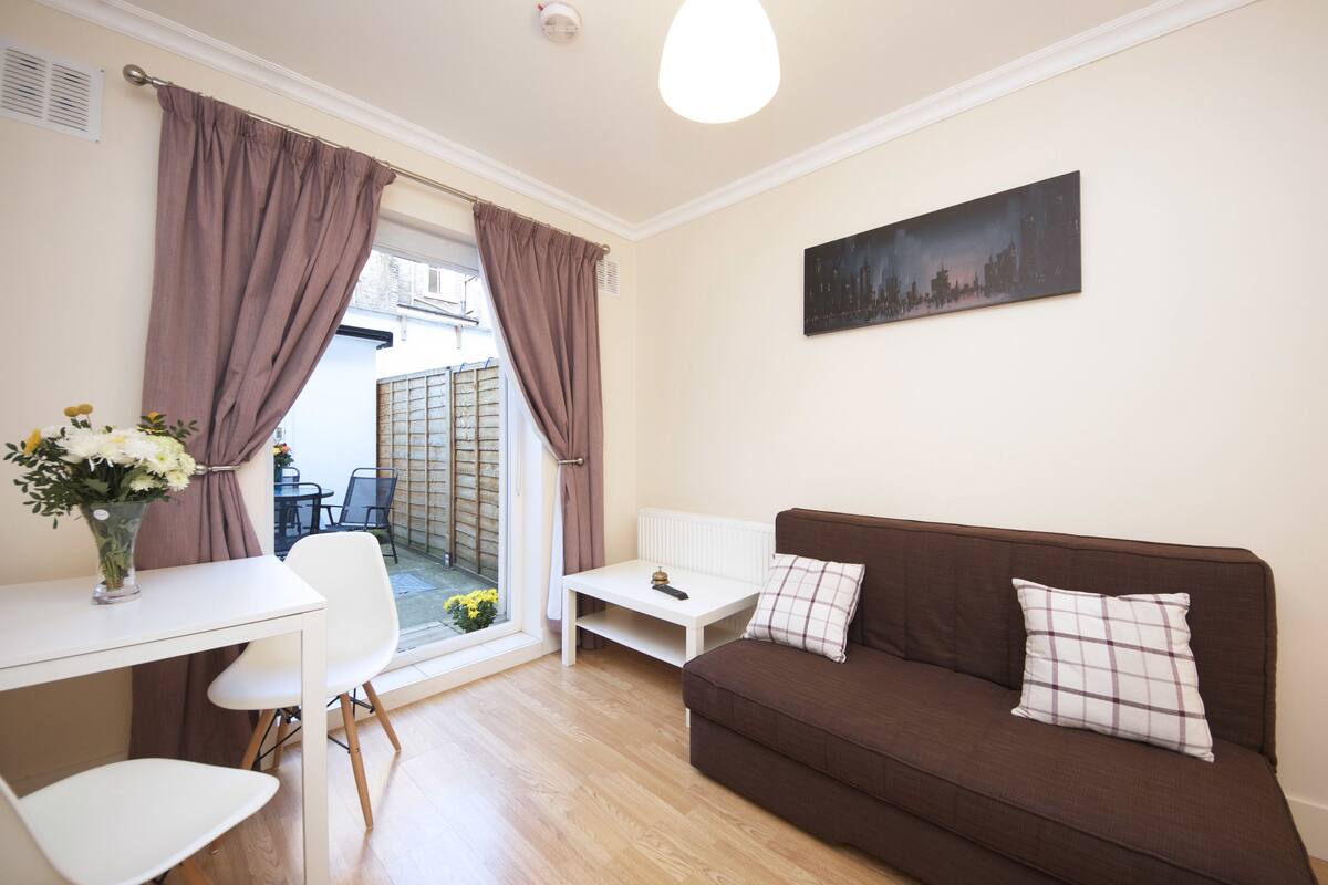 Apartment, Patio | Living area | Flat-screen TV