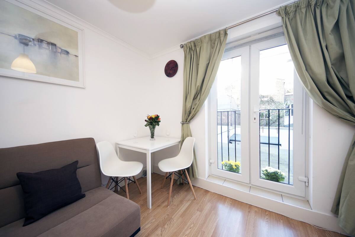 Standard Apartment, 1 Bedroom | Living area | Flat-screen TV