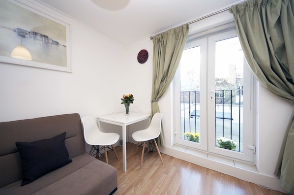Standard Apartment, 1 Bedroom | Living area | Flat-screen TV