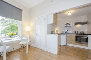Standard Triple Studio | Private kitchen | Full-sized fridge, microwave, stovetop, coffee/tea maker