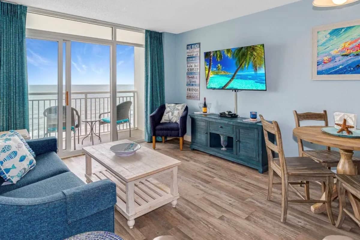 Deluxe Condo, 1 Bedroom, Ocean View, Oceanfront (935) | Living area | TV, DVD player