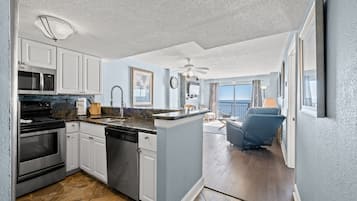 Luxury Condo, 2 Bedrooms, Fireplace, Oceanfront (601 - Corner Unit) | Private kitchen | Full-size fridge, microwave, stovetop, dishwasher