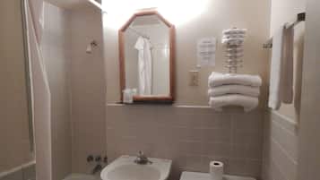 Standard Room, 1 King Bed, Smoking | Bathroom | Combined shower/bathtub, free toiletries, hair dryer, towels