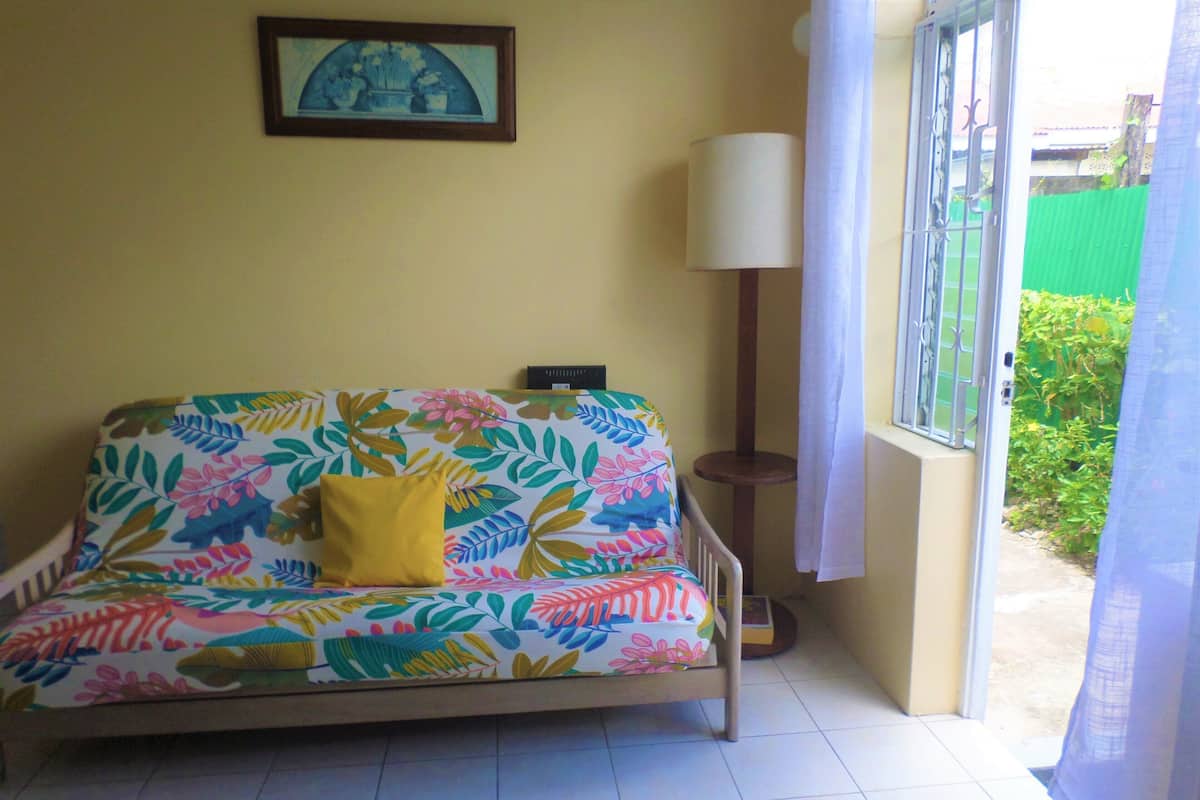 Economy Apartment, 1 Bedroom, Refrigerator & Microwave, Garden Area | In-room safe, desk, blackout curtains, iron/ironing board