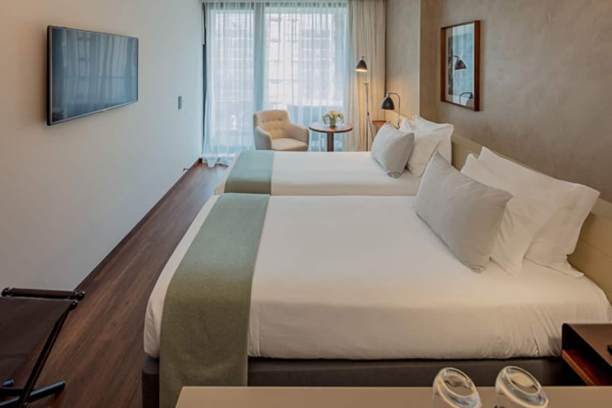 Family Room | Minibar, in-room safe, desk, soundproofing