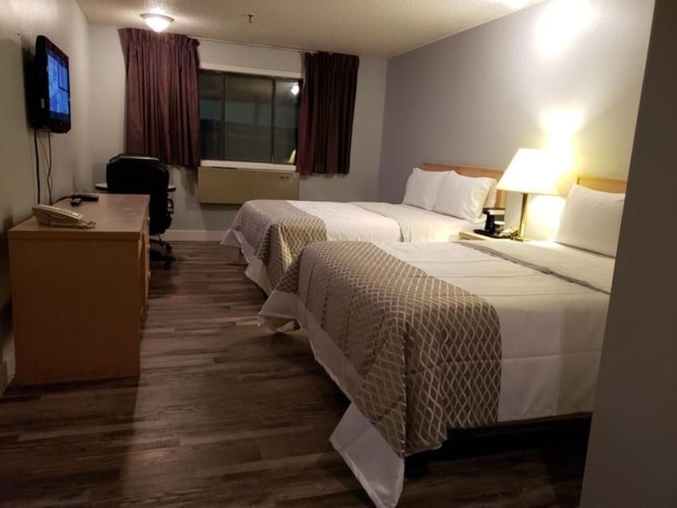 Desk, blackout curtains, free WiFi, bed sheets