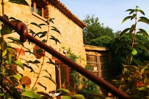 Experience the tranquility of this historic building surrounded by lush greenery.